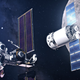 Artist’s conception of Gateway with the SpaceX Dragon XL logistics module on approach to docking.